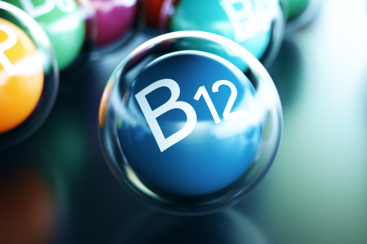 Vitamin B12, on black background. Symbol of health and longevity, 3d rendering | RenovoMD in Northborough, MA